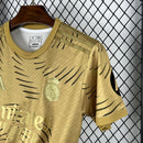 CAMISOLA DO REAL MADRID 25/26 DOURADO TREINO